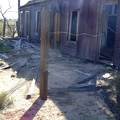 The front exterior of the collapsing house at Cima