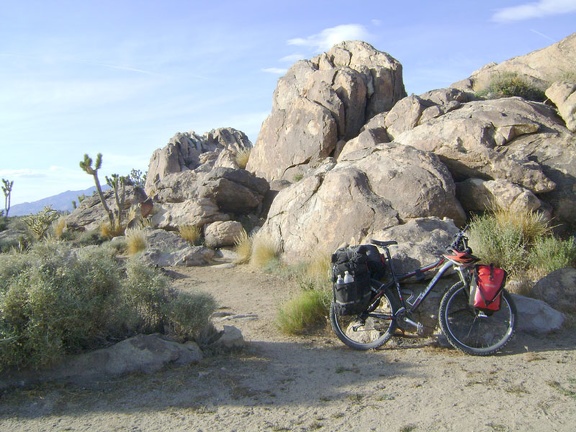 A half a mile beyond Sunrise Rock, I choose a campsite next to a rock pile where I camped last year and set up my tent