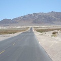 Just past Grimshaw Dry Lake, Tecopa Hot Springs Road heads straight toward the mountains