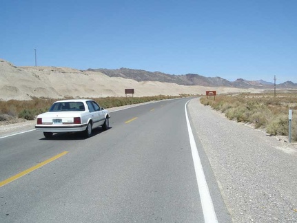 A car passes me as I head up Highway 127