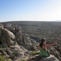 Sarah takes a break on Teutonia Peak, overlooking the subtle curve of Cima Dome