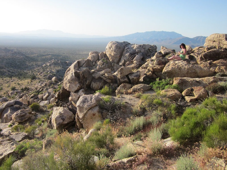 We're all taking photos of each other; Sarah sits on one of the Teutonia Peak ridges