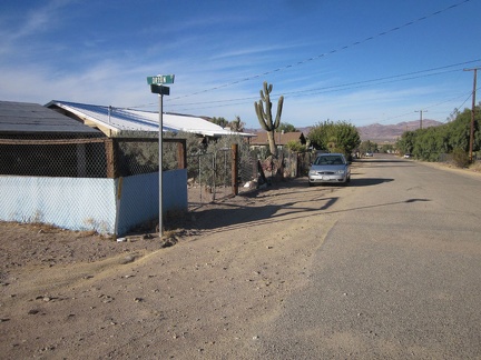 I ride up a quiet residential street in the village of Daggett