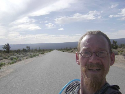 I resume the climb up Cedar Canyon Road and stop to enjoy the view down the road from where I just came