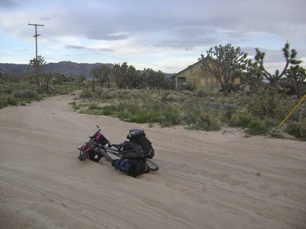 I look across the sand trap here and ponder the abandoned buildings at Death Valley Mine