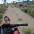 I start riding, and sometimes walking, the 10-ton bike up Castle Peaks Road, the final leg of today's trip