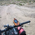 The short, rugged descent down the hill off the dam on Castle Peaks Road would require high clearance