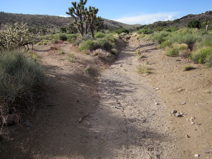 Castle Peaks Road beyond the dry reservoir continues to deteriorate