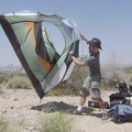 Intermittent strong gusts of wind make taking down the tent a bit like launching a kite