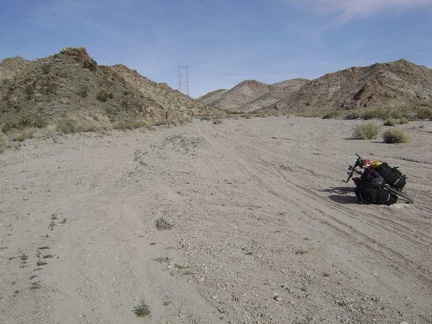 Hike-a-biking through sand on the way up Jackass Canyon Road