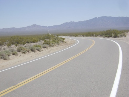 Three miles down Ivanpah Road, I reach "the big curve"