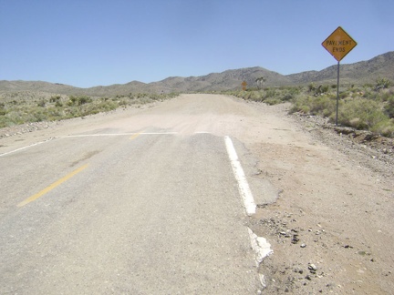 I ride another 2.5 miles up Ivanpah Road, climbing 400 feet in the process, and then the pavement ends