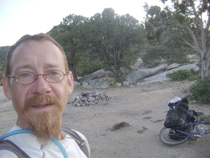 I drag the bike over to the nearby campsite and this happy camper calls it a day