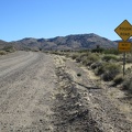 There's that threatening sign again on Ivanpah Road: Rough Road, Next 23 Miles