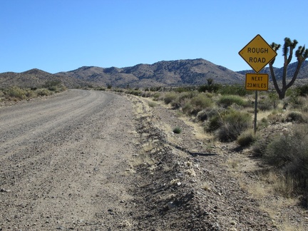 There's that threatening sign again on Ivanpah Road: Rough Road, Next 23 Miles