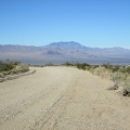 I ride a short distance up Ivanpah Road and turn back to take in the great view across Ivanpah Valley behind me