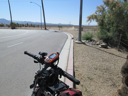 After my coffee and water stop at the gas station (I don't need gas), I leave pavement and ride down this dirt road out of Primm