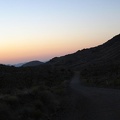 The sun goes down behind me with a nice belt-of-Venus over Ivanpah Valley below as I continue riding up Ivanpah Road