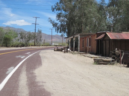 The 10-ton bike and I wobble up Nipton Road away from the campground and pass a few antique buildings while leaving town