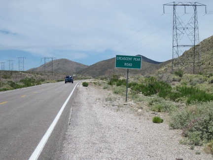 Riding east toward Crescent Pass on Nevada 164, I pass under the power lines that cross Mojave National Preserve