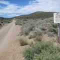 Near Crescent Pass, I stop to look at a dirt road that leads toward the McCullough Mountains