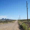I pass the six-mile marker on Walking Box Ranch Road