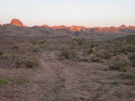 The sun sets, little by little, minute by minute, on the Castle Mountains and Hart Peak