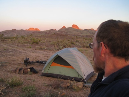 The upper turrets of the Castle Mountains and Hart Peak soak up the very last rays of the day