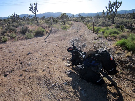 I take a short energy-bar break where I leave the powerline road for a lesser road heading toward the Pine Spring area