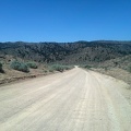 The rough washboard of upper Black Canyon Road prevents me from gaining any speed as I decend to the Cedar Canyon Road