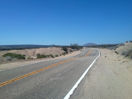 I have almost five miles to ride up the gently rising Kelso-Cima Road until I reach Cima and the possibly open Cima store