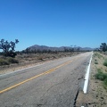 On upper Morning Star Mine Road, I'm heading toward the Ivanpah Mountains, with Kessler Peak at the left