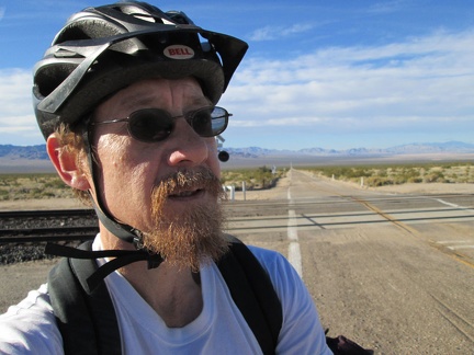 I arrive at the pavement of Ivanpah Road just after mile 10 and have over 3 miles of pavement ahead