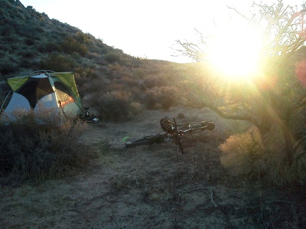 Sunset back home at the tent near Twin Buttes, I fix the broken rack piece on my bike (glad I brought extra parts!)