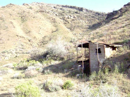 The outhouse here at Tough Nut Mine is a concrete structure