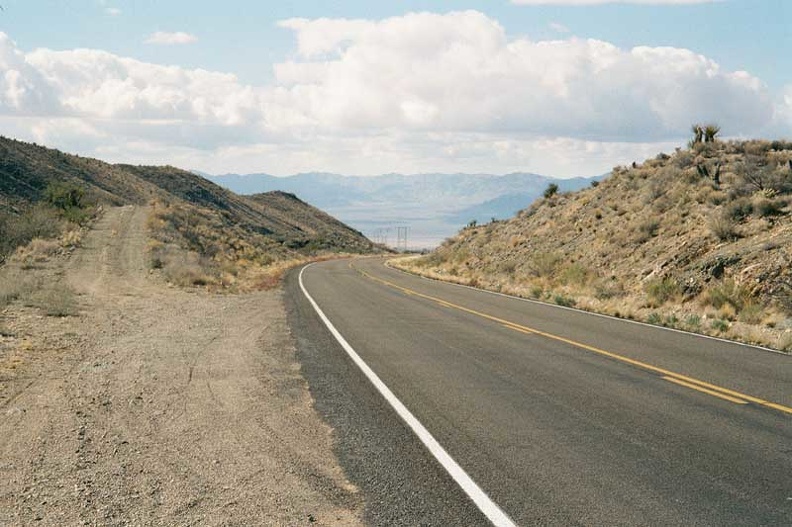 Nipton Road, now Nevada Highway 164, rises through a pass between the New York Mountains and the McCullough Mountains