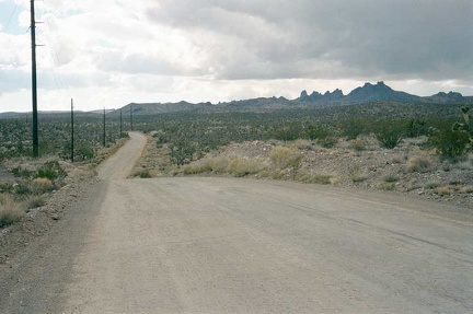 Walking Box Ranch Road passes fairly close to the Castle Peaks, which are visible from Nipton down below on the other side