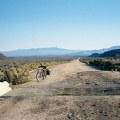 Just beyond the end of the pavement, Black Canyon Road crosses a cattleguard