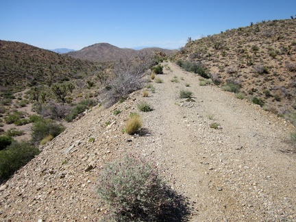 Piling the earth for the raised Ivanpah railway bed in low areas would have been as much work as cutting through the hills