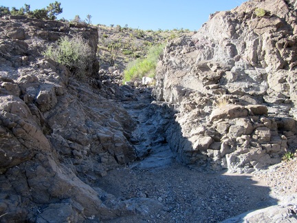 On the way up out of Willow Wash, I hike through the first of several small water-carved drainages in the rocks