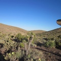 I hike through an upland valley on the way back to my campsite at the end of Castle Peaks Road