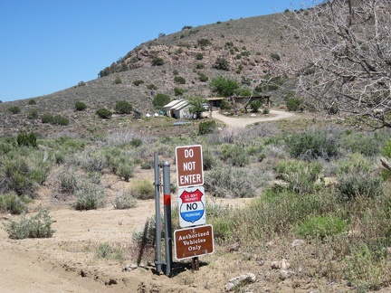 After 1.5 miles on Woods Wash Road is government property, probably a residence for Preserve staff