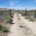Another fence boundary to pass through as I ride down to Woods Wash
