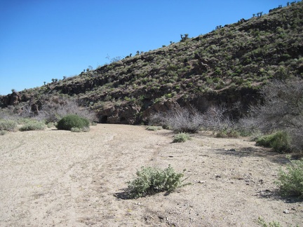 I reach the lava flows of the historic Woods Wash area