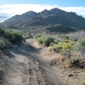 At other moments, the road heads straight toward the Twin Buttes
