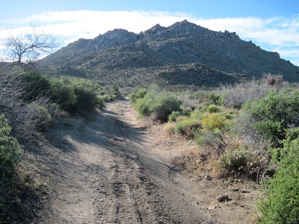At other moments, the road heads straight toward the Twin Buttes