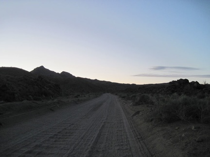 Bumpy, bumpy, slowly uphill pedaling on the upper part of Black Canyon Road