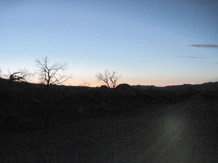 My headlight goes on as Black Canyon Road turns black