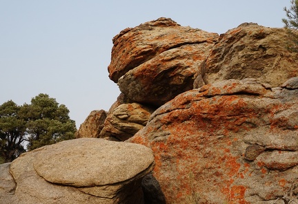 Pancake Rock and the hungry orange lichen monster