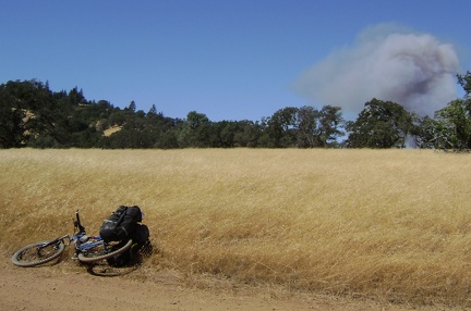 The huge 2007 Henry Coe Park fire starts small and innocently on my way out of the park after a week-long bikepacking trip